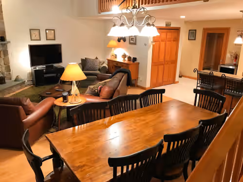 Everything for a crowd, TV, games, stereo, fireplace & harvest table for dining at The ski slope is your backyard! Luxurious