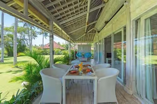 Outdoor dining at Sungai Tinggi Beach Villa