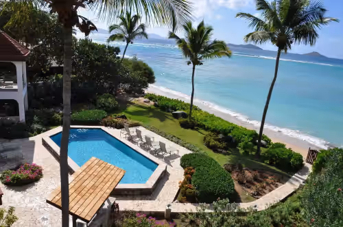 Caribbean Wind,  6 bedroom luxury beachside villa Mahoe Bay.