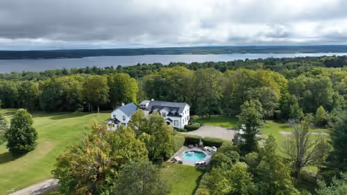 The Manor perched above CHQ 
Lake & CHQ Institution