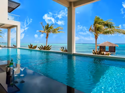 The Grand Palm Residence - 7BR Oceanfront Villa w/ 5 Master Suites, Bunk Room, Swim-Up Bar
