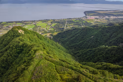 You can see the trail surrounding our property in this photo and the Homer Spit at Playful Ravens