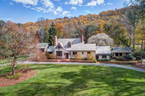 Historic 8 BR Tudor on 3 1/2 Acres. Private estate and beautiful setting.