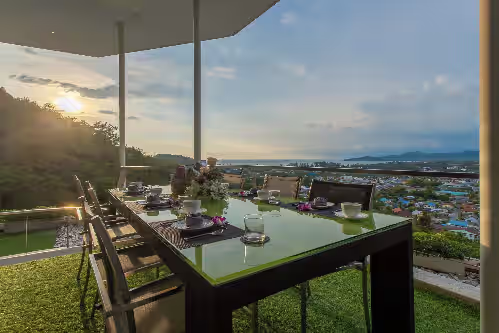 Outdoor dining at Villa Beyond & Namaste 16-Bedroom Seaview Villas