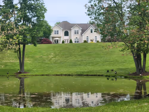 13-Acre Luxury Estate with Private Lake, Private Golf Range, Forest with Hiking