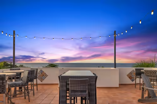 Rooftop sunsets at Casa D'Palma-steps to Sandy Beach