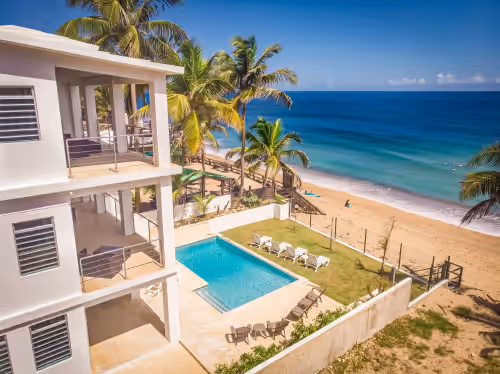 "Seas the Day" at Sandy Beach, beachfront wedding venue in Rincon, Puerto Rico