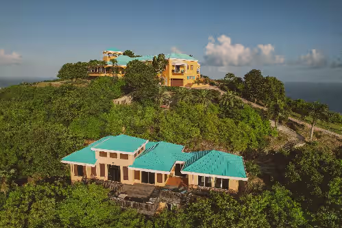 Our cottage (bottom) has 2 bedrooms, and the main house (top) has 5 bedrooms at The Polaris Pointe of St. Croix