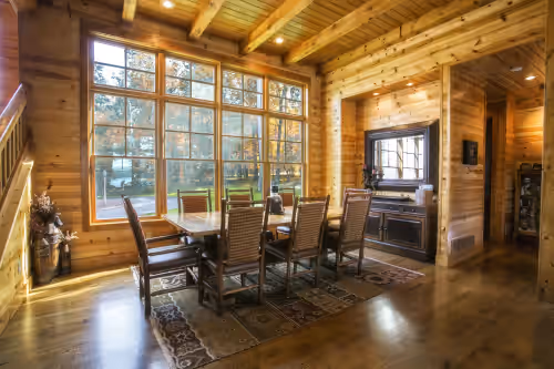 DINING ROOM WITH VIEW OF THE WOODS. at 178' of Sandy Lake Shore on Private Lake